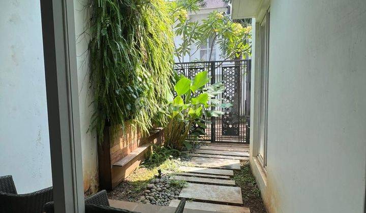 Rumah cluster Palm Spring Jakarta Garden City lebar muka 12m 2