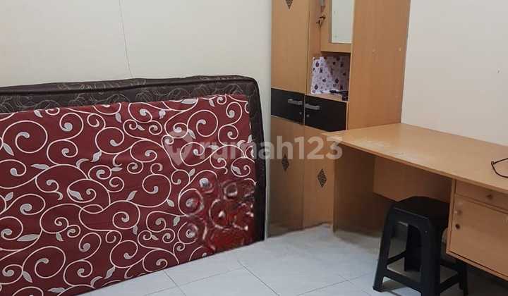 1253 Kos + business Tomang