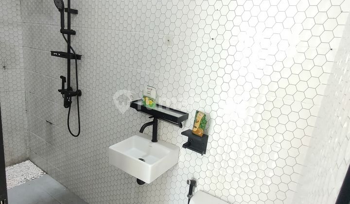 Rumah Minimalis modern di Kencana Loka, 24 jam security 2