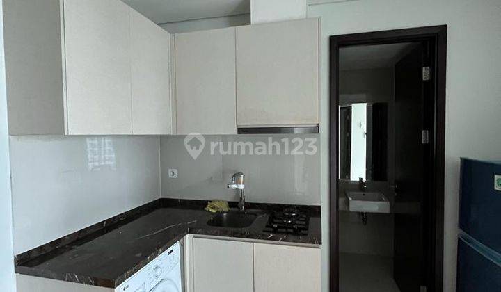 Disewakan Apartemen Puri Mansion 2+1 BR Semi Furnished Pm 547 2