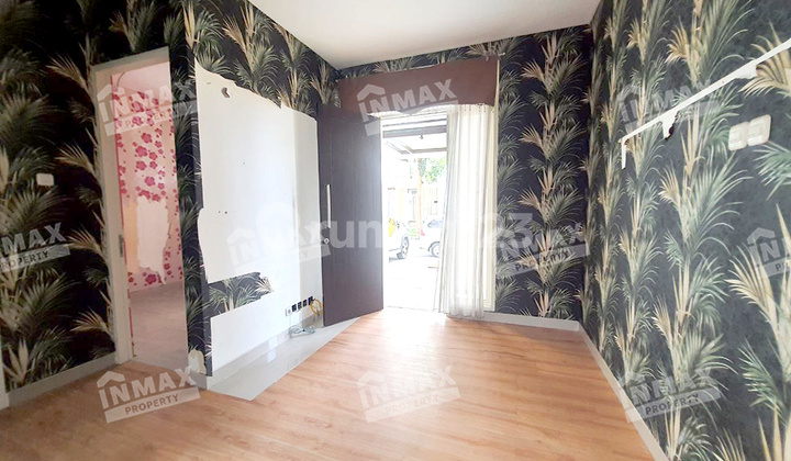 Minimalist 2-Story House in Citra Garden City Malang, with a Backyard