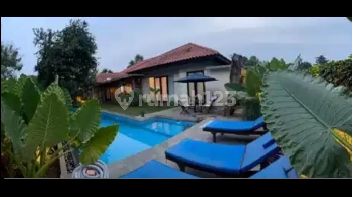 LUXURIOUS LUSH HOUSE WITH MODERN TROPICAL STYLE IN KEMANG, SOUTH JAKARTA
