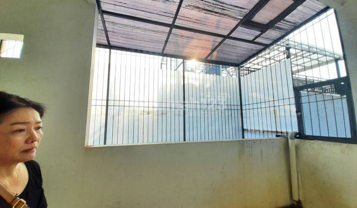 Tomang Rumah  Jalanan Lebar