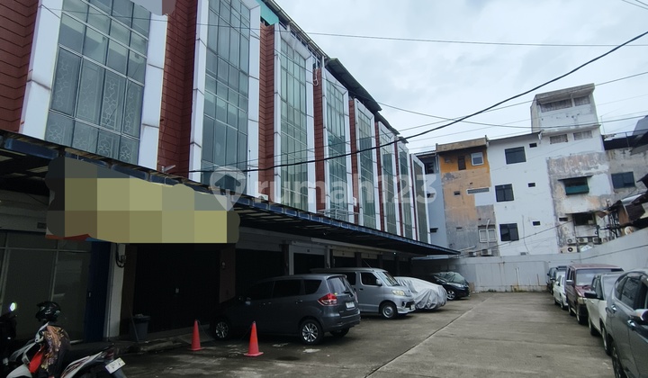 4-Storey Commercial Ruko Ideal for Business and Living, Spacious Parking. 2