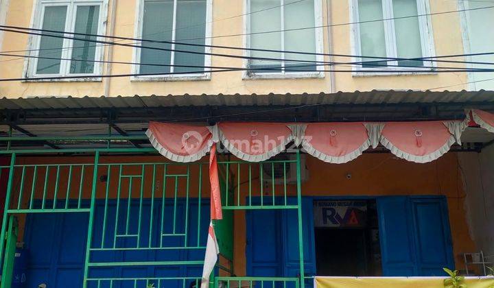 Ruko dua lantai dalam kompleks NTI Makassar 1