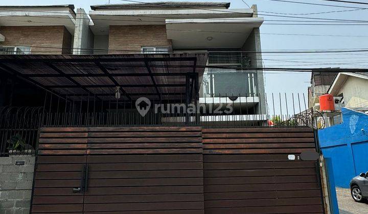 Leon K Dijual Rumah di Karang Tengah Full Furnished Strategis 1