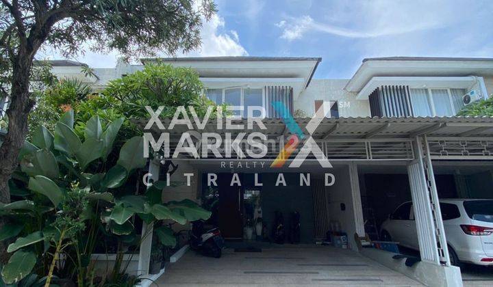 tampak depan rumah citraland pelican hill bangunan