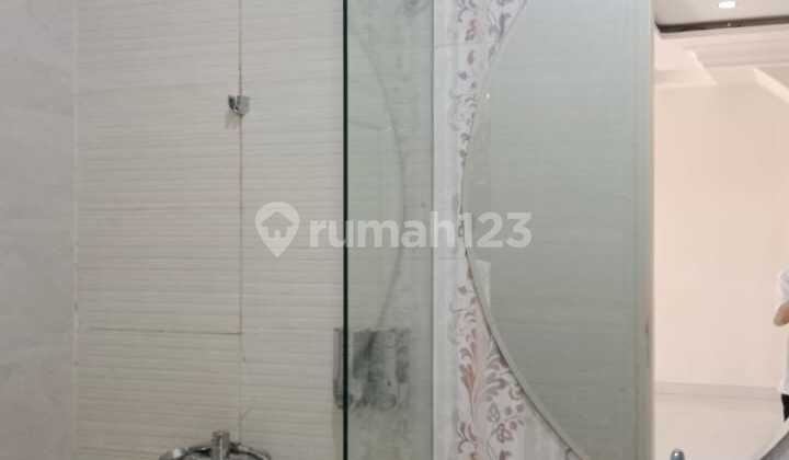 Rumah Minimalis Kolam Renang di Pakuwon Indah, Surabaya (BB) 2