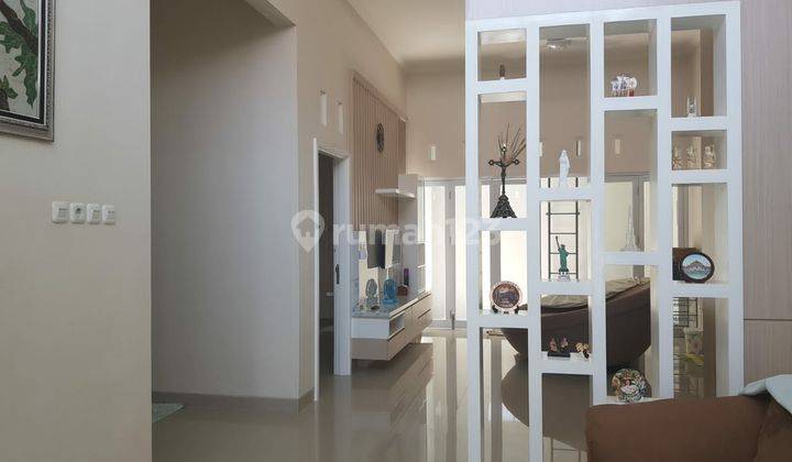 Rumah bagus full furnished cluster solo baru 2