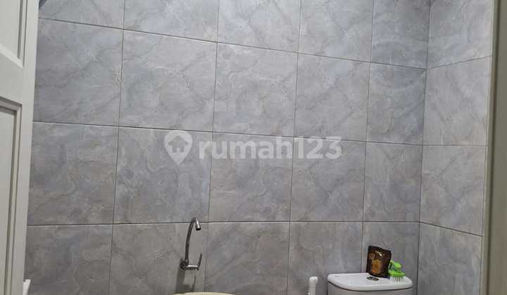 Two-Story House in a Cinere Complex 2