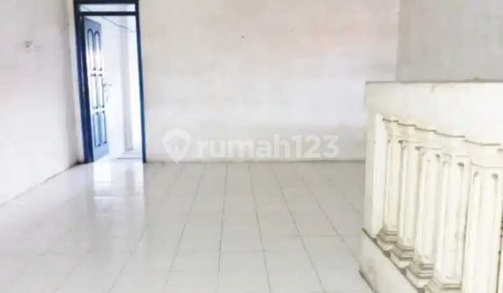 TWO-STORY SHOPHOUSE ON SAMANHUDI STREET, GRESIK TWO-STORY SHOPHOUSE ON SAMANHUDI STREET, GRESIK