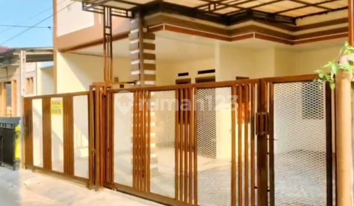 Strategic 3-Story New House at Sawangan Toll Road Strategic 3-Story New House at Sawangan Toll Road