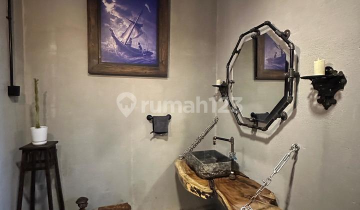 2-story house + Rooftop with an Industrial concept, located in the elite Setia Budi area, South Jakarta. 2