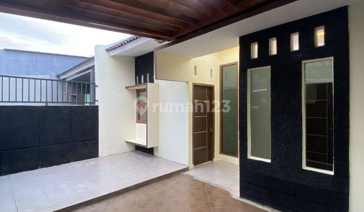 Rumah Cantik Cluster Woltermonginsidi  2