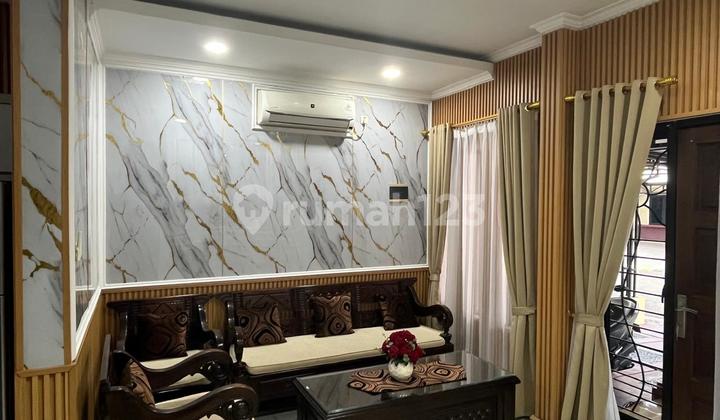 Rumah Murah Rapi Modernland 2 Tingkat Lt 130