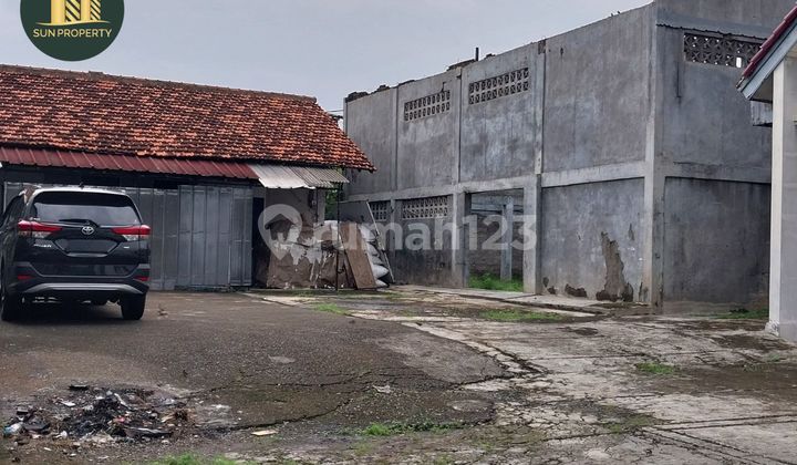 Gudang Raya Tapos (across from Gudang Spare Part Wahana Motor)