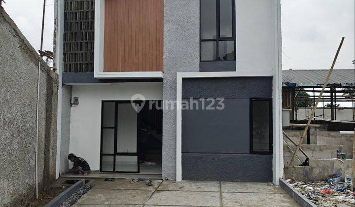 Rumah Modern 1,5 Lantai Konsep Mezzanine di Pondok Cabe Tangsel. 2