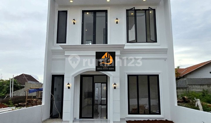 T100.rumah Classic Dlm Komplek One Gate di Jatibening Kota Bekasi