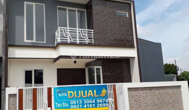 Rumah baru 2 lantai hadap Timur di Rungkut Asri desaign apik minimalis modern 1