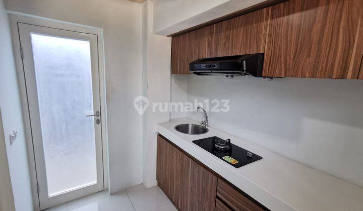 Rumah Apartemen Garden Town House  7