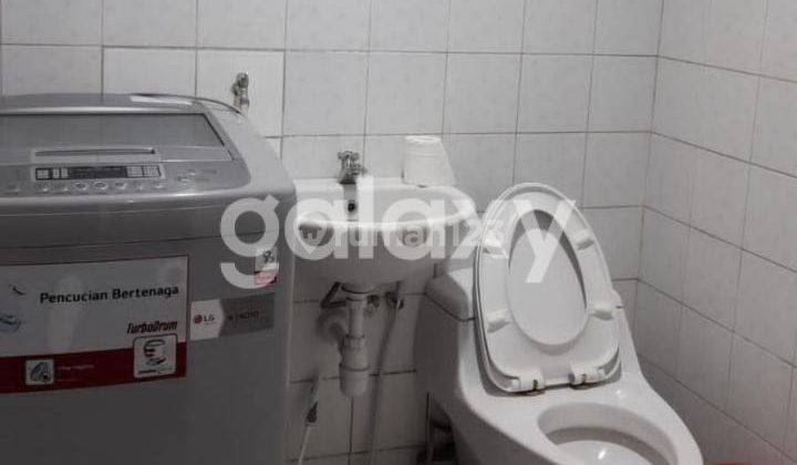 tampak depan rumah semi villa 2 lantai