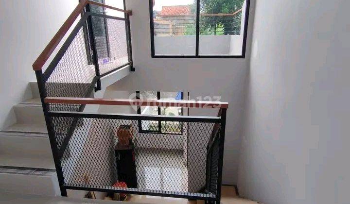 Rumah 2 Lantai dgn 3kamar dan rooftop mezzanine room KPR BSI , 1KM dari kampus IBLAM tanah baru Beji  1