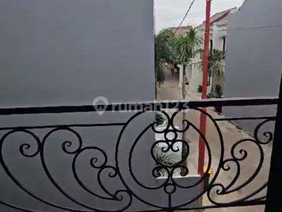 Disewa Rumah Bagus dalam Cluster Ciganjur Jagakarsa, Luas Tanah 66M, Bangunan 2 lantai, 3 kamar tidur, bebas banjir, harga 65 JT nego Opay 2