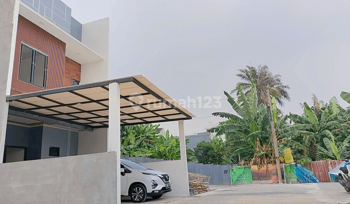 Rumah dlm cluster strategis 600 mtr ke pintu tol krukut 1