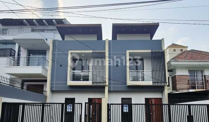 New 2-Storey Architect's House in Meruya West Jakarta - Red Brick Specs, Skylight & Granite