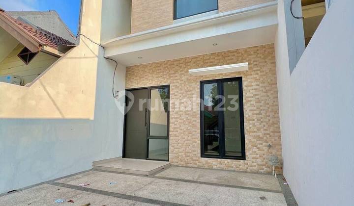 Rumah Modern Minimalis di Nirwana Eksekutif Rungkut 2 Lantai SHM 2