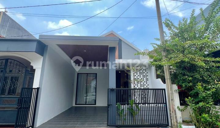 Rumah Modern Compact Pakuwon City Cluster Griya Asri Furnished 1