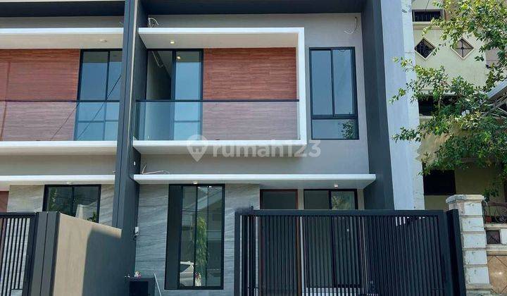 Rumah Modern Minimalis Manyar Kertoadi 2 Lantai Hadap Utara 1