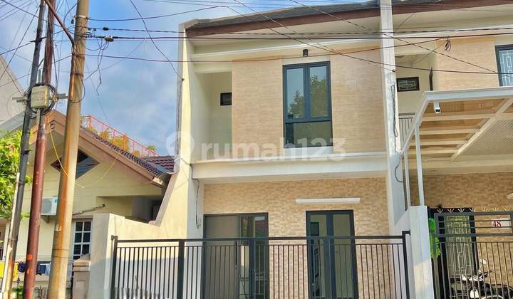 Rumah Modern Minimalis di Nirwana Eksekutif Rungkut 2 Lantai SHM