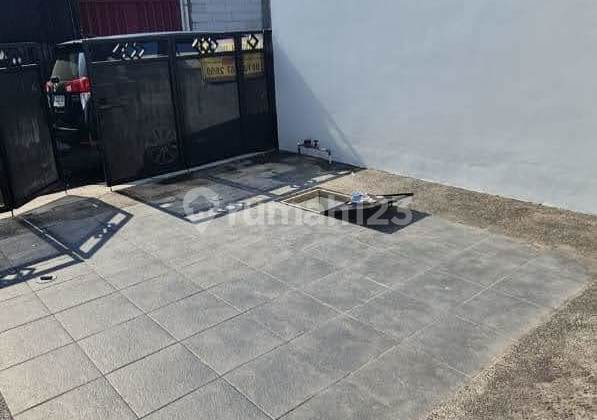 New Modern Mezanine 1.5-Story House in Gunung Anyar 2