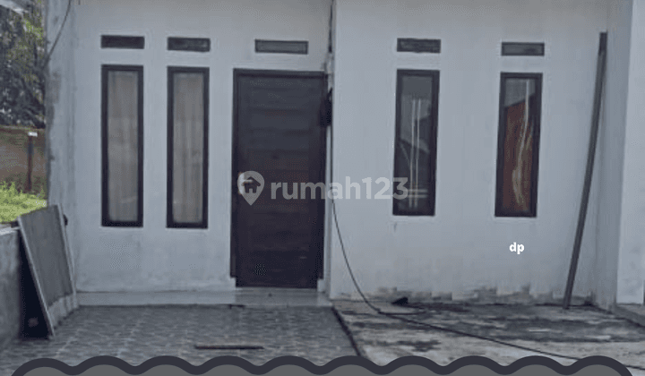 Rumah Mungil Dan Nyaman Untuk Keluarga Kecil 1