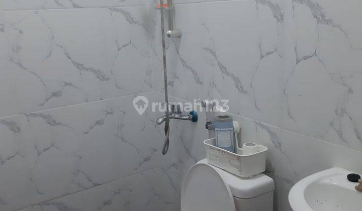 Rumah 2 Lantai Rapi Siap Huni di Regensi Melati Mas 15