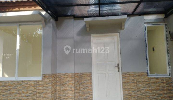 Rumah di Graha indira hadap Timur murah 2