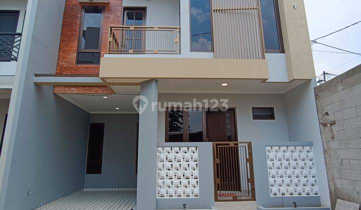 Di Jual Rumah 2 lt Siap Huni nempel sekolah Elit dalam Komplek 3 menit dari Toll Depok 2