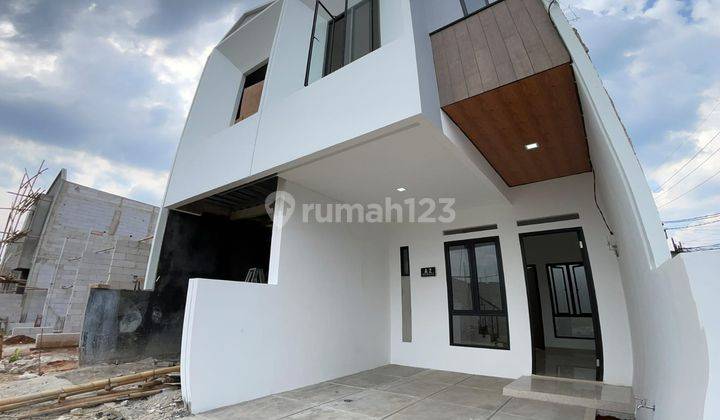 Rumah 2 Lt Pinggir Jalan Raya 10 Menit Stasiun Depok 2