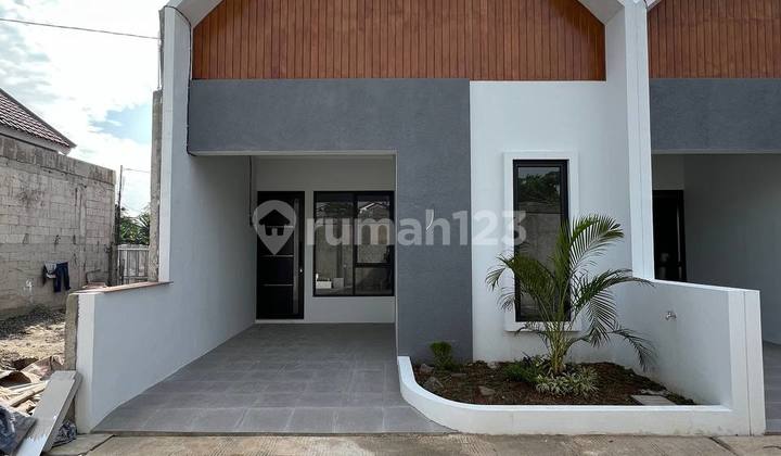 Rumah Fasilitas Rooftop Akses 10 Menit ke Kampus Ui Depok