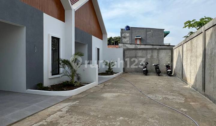 Rumah Fasilitas Rooftop Akses 10 Menit ke Kampus Ui Depok 2