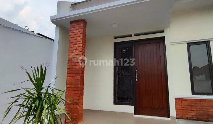 Rumah Baru Minimalis modern cuma 15 menit ke Tol Cimanggiss 2