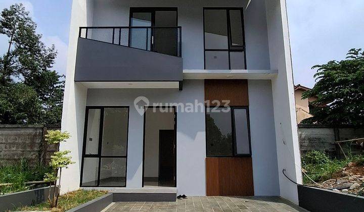 Rumah 2lantai Desain Tropical Modern Shm Dekat Stasiun Bogor  1