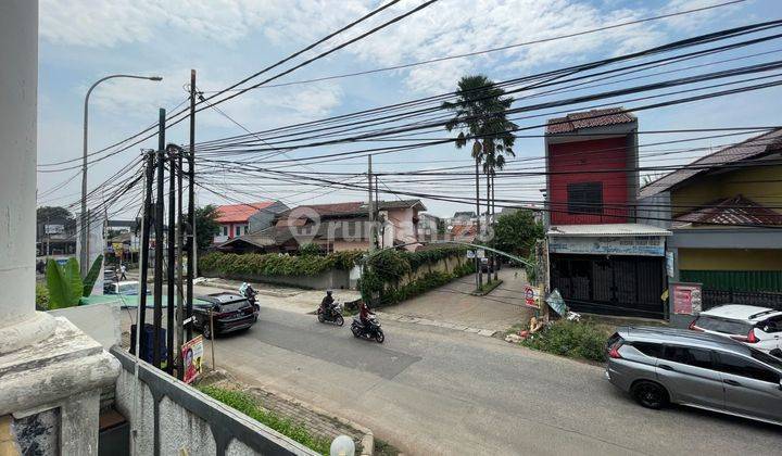 Rumah lama 2 lantai jalan raya bukit cinere strategis  cocok  untuk  investasi  1