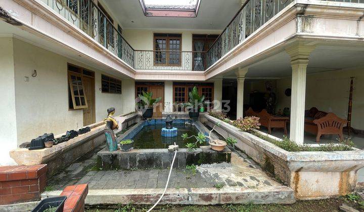 Rumah lama 2 lantai jalan raya bukit cinere strategis  cocok  untuk  investasi  2