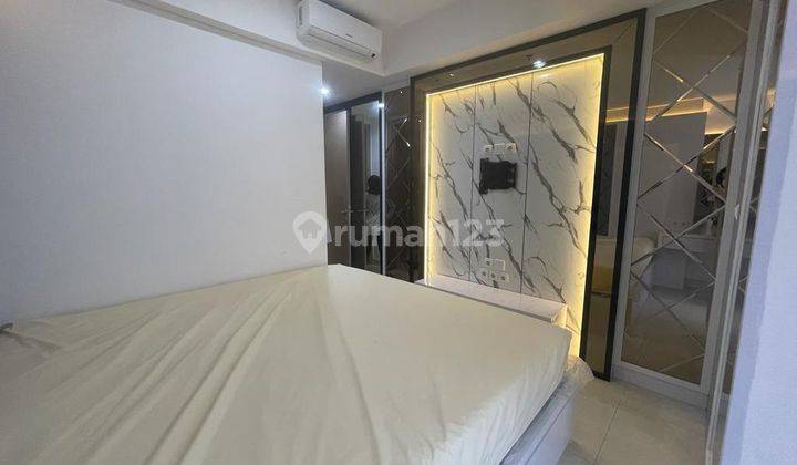 Sewa Apartemen Gold Coast Furnish Mewah 1 Bedroom View Pool 1