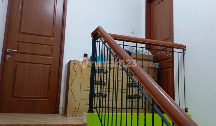 Rumah Murah 2 Lantai Semi Furnished di Raffles Hills, Cibubur 2