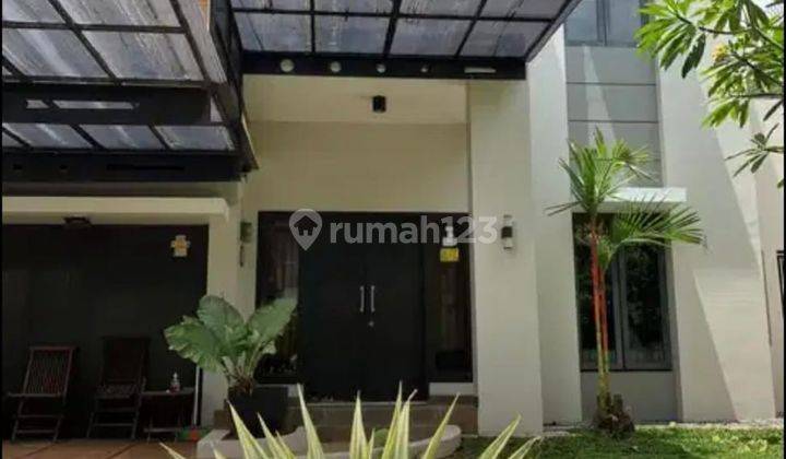 Rumah Cantik Dekat Taman di Raffles Hills, Cibubur 1