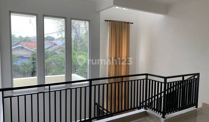Rumah murah di tanah Kusir jakarta selatan minimalis modern bagus dua lantai 11