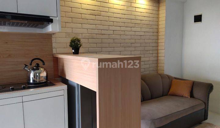 Apartemen Green Pramuka City 2 BR Second Murah 1